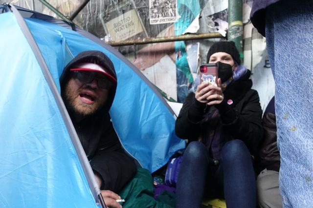 The scene of the rainy standoff at an encampment in the East Village on Wednesday.
